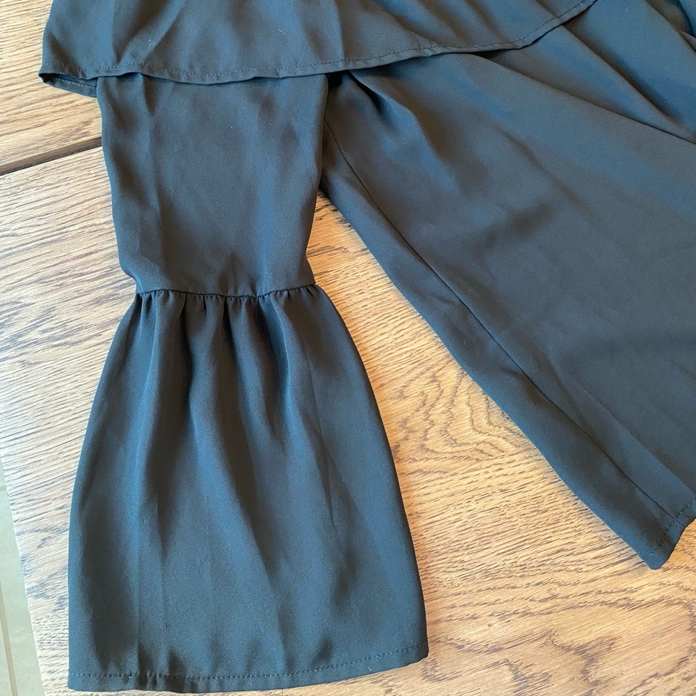 Black off shoulder with ruffle top